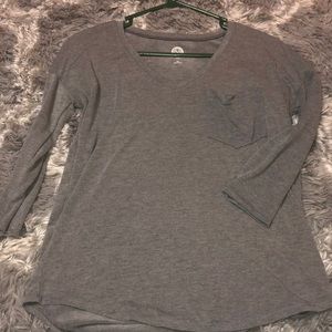 grey shirt, half sleeves.